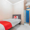 Отель Mulia Raja Kost by OYO Rooms, фото 15