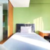 Отель Warm Studio Apartment at Harvard Jatinangor, фото 14