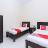 Отель OYO 1680 Dahlia Guesthouse, фото 5