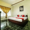 Отель OYO 90490 Hotel Nyi Rindang, фото 7