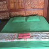 Отель Don Som Riverside Guesthouse, фото 1