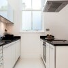Отель Luxurious and Spacious 3 Bed in Battersea, фото 2