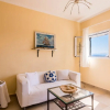 Отель Seaside Ipsos Apartment By Konnect, фото 5
