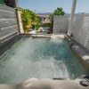 Отель Holiday Apartment With a Private Terrace & Hot Tub, Near the Beach, фото 7