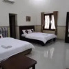 Отель OYO 1190 Ndalem Katong Guest House, фото 32