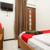 Отель RedDoorz Syariah near Singha Merjosari Park, фото 7