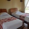 Отель Kampung Lumbung Boutique Hotel в Бату