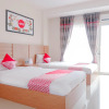 Отель OYO 696 Hasanah Guest House Syariah De Saphire, фото 3