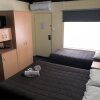 Отель Benjamin Singleton Motel, фото 3
