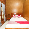 Отель OYO 1230 Kampoeng Osing Syariah Guesthouse, фото 3