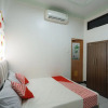 Отель OYO 92702 Minang Jaya, фото 5