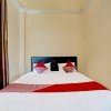 Отель OYO 91873 Nugraha Kost, фото 15