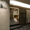 Отель OOKINI HOTELS Yotsubashi Horie Apartment в Осаке