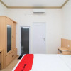 Отель Macan Kumbang Residence by Reddoorz, фото 12
