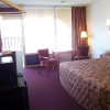 Отель Travelers Inn and Suites, фото 3