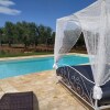 Отель Antico trullo ristrutturato con piscina e giardino, фото 13