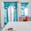 Отель Comfortable Studio Room At Vida View Makassar Apartment, фото 9