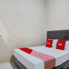 Отель OYO 92826 Penginapan Syariah Faster Inn, фото 4