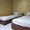 Отель OYO 93411 Syariah Hotel Tomborang, фото 4