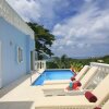 Отель Blue Moon - A Caribbean Paradise On Cap Estate's Golf Course With Private Pool And Seaview 2 Bedroom, фото 1