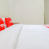 Отель OYO 2030 Melawai Homestay, фото 14