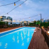 Отель Gangneung Sol House Pension (Four Seasons Heated Swimming Pool), фото 1