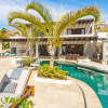 Отель Spectacular 3-Story Beachfront Villa with a Huge Pool Patio, фото 1