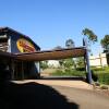 Отель Coachman Motel, фото 1