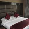 Отель Xishuangbanna Huixiang Business Hotel, фото 5