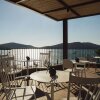 Отель Domes Aulus Elounda - Adults Only - Curio Collection by Hilton, фото 16