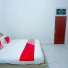 Отель OYO 2301 Hocky Guest House, фото 14