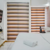Отель Minimalist Studio Apartment with City View at M-Town Residence, фото 7