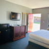 Отель Travelers Place Inn & Suites, фото 6
