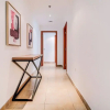 Отель Palatial 2BR Apartment with Sleek Finish, фото 3