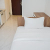Отель Nice And Comfort Studio Room At Sky House Bsd Apartment, фото 7