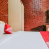 Отель OYO 774 Villa 007 Sengkaling, фото 15