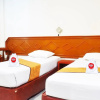 Отель OYO 717 Hotel Dharma Utama Syariah, фото 24