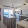 Отель Beachfront Penthouses at Brisas by The Spot, фото 37