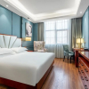 Отель New Century Manju·Ningbo Fenghua Wanda Plaza Store, фото 4