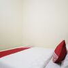 Отель OYO 654 Fabio Guest House Syariah, фото 17