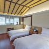 Отель Lijiang Qilu Garden Hotel, фото 6