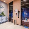 Отель Century Star Boutique Hotel (Zhoukou Railway Station Red Star Macalline Branch), фото 2