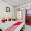 Отель OYO 90461 Graha Atmadja Syariah Guest House, фото 3