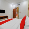 Отель OYO 90820 Madania Guesthouse Syariah, фото 4