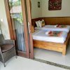Отель Putu's Paradise Guesthouse, фото 2