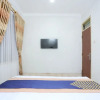 Отель OYO 2268 Tim-tim Homestay Syariah, фото 3