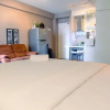 Отель Large and Minimalist Studio at Pakubuwono Terrace Apartment, фото 3