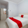 Отель RedDoorz Syariah near Stasiun LRT Bumi Sriwijaya, фото 3
