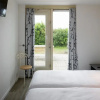 Отель Holiday Home With Microwave, in a Holiday Park, Beach Within Walking Distance, фото 6