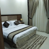Отель Elite Furnished Suites, фото 10